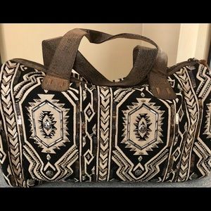 Beaded Aztec print duffel bag.